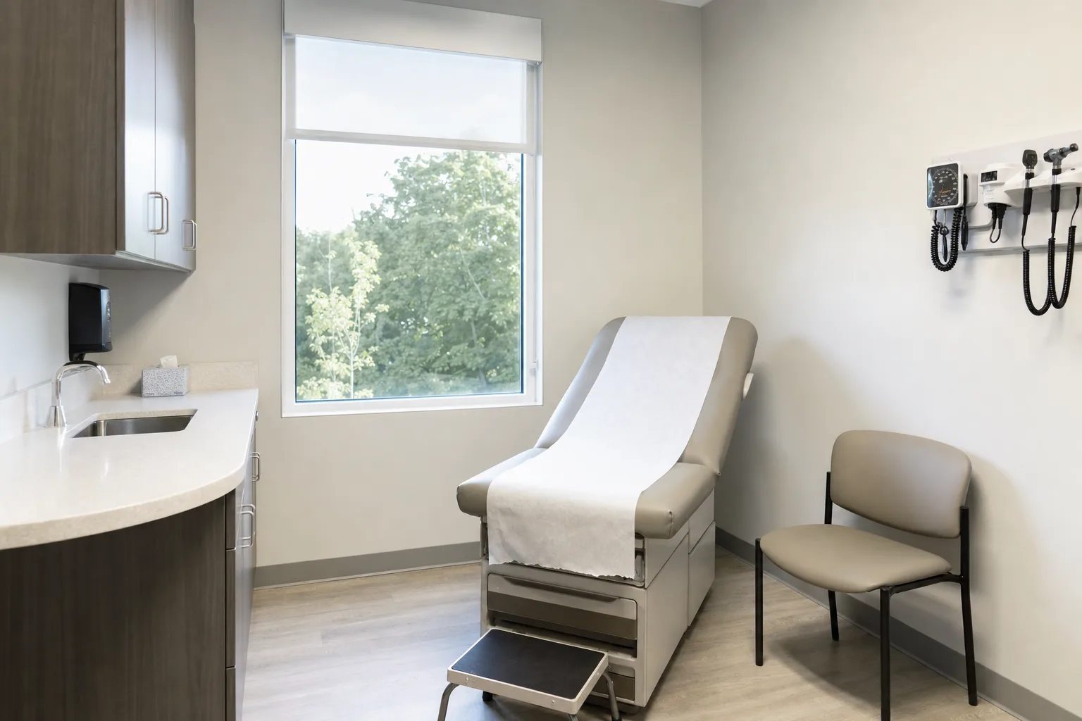 Spotless exam room maintained to medical office cleaning standards